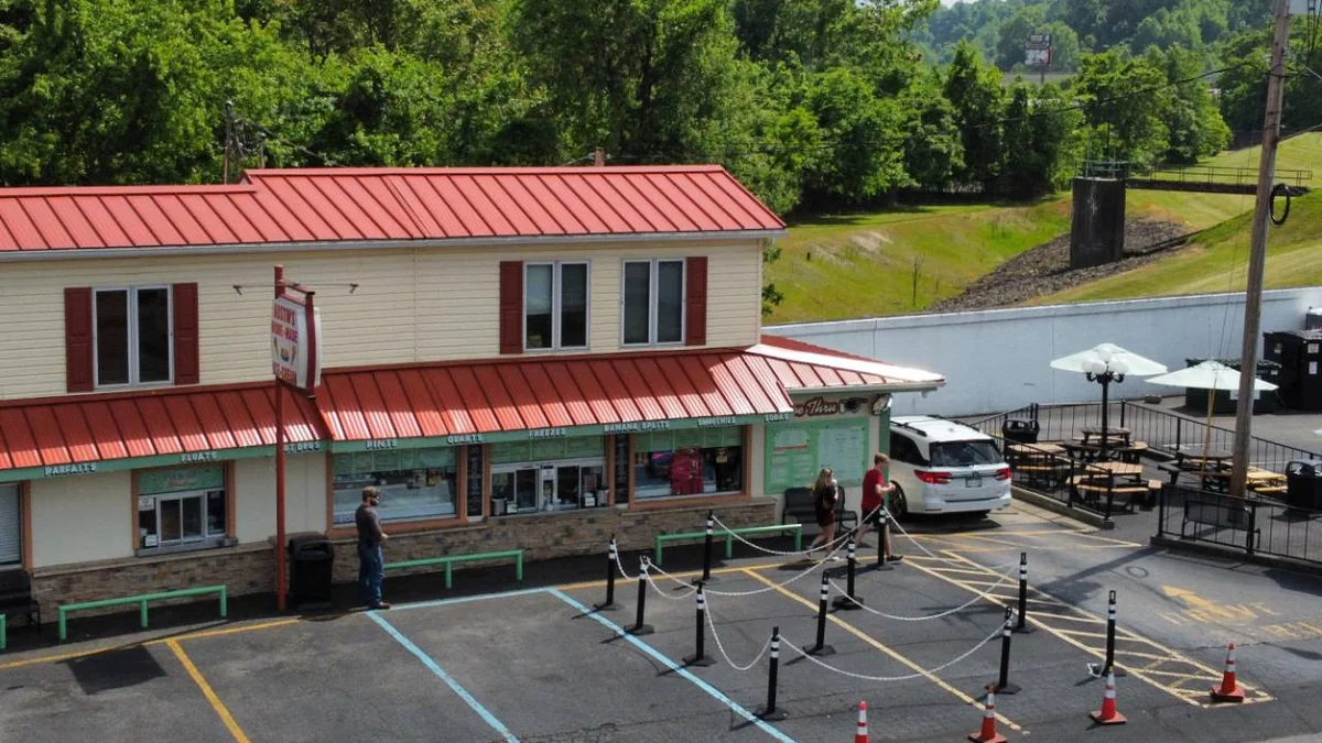 Drone view of Austin’s Homemade Ice Cream shop and outdoor seating in Ceredo, West Virginia